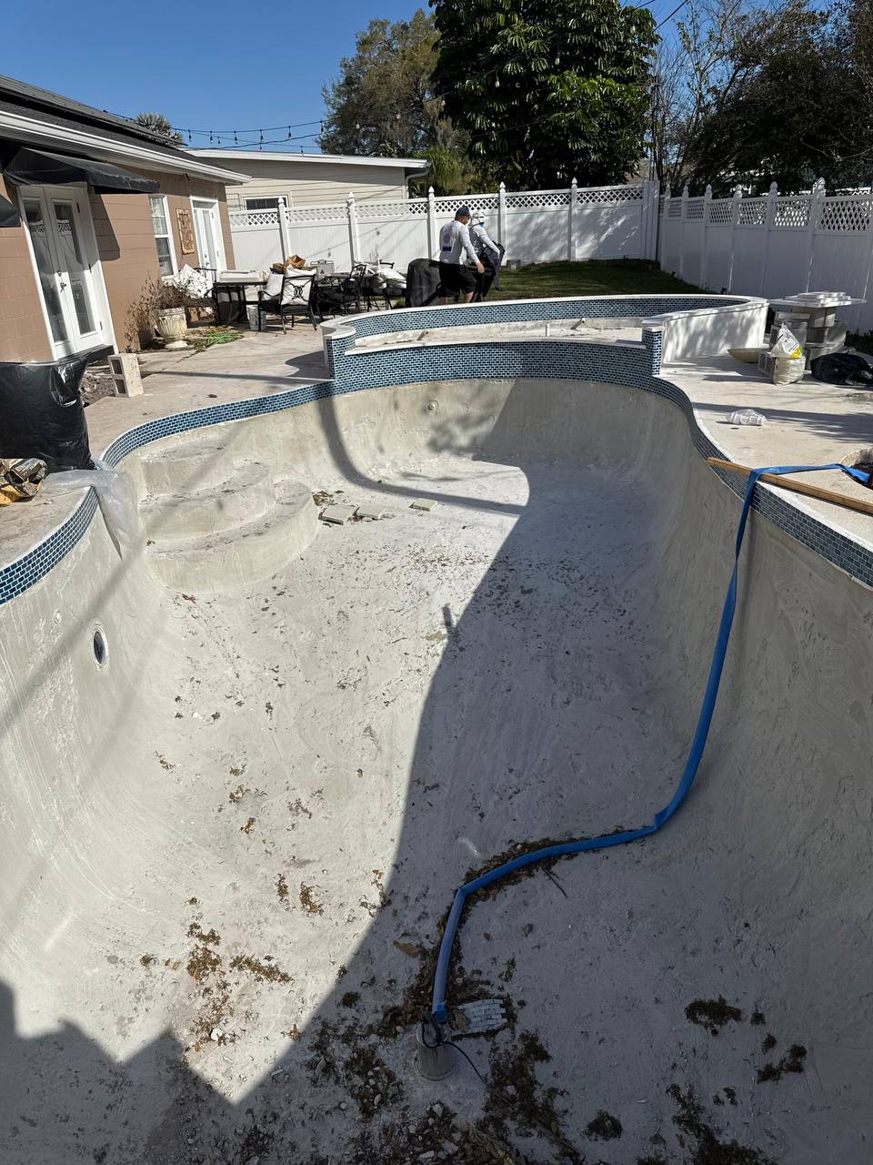 Pool before renovation - empty concrete shell